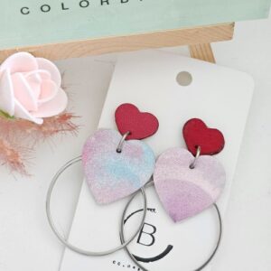 boucles d'oreilles ronde fuschia cuir