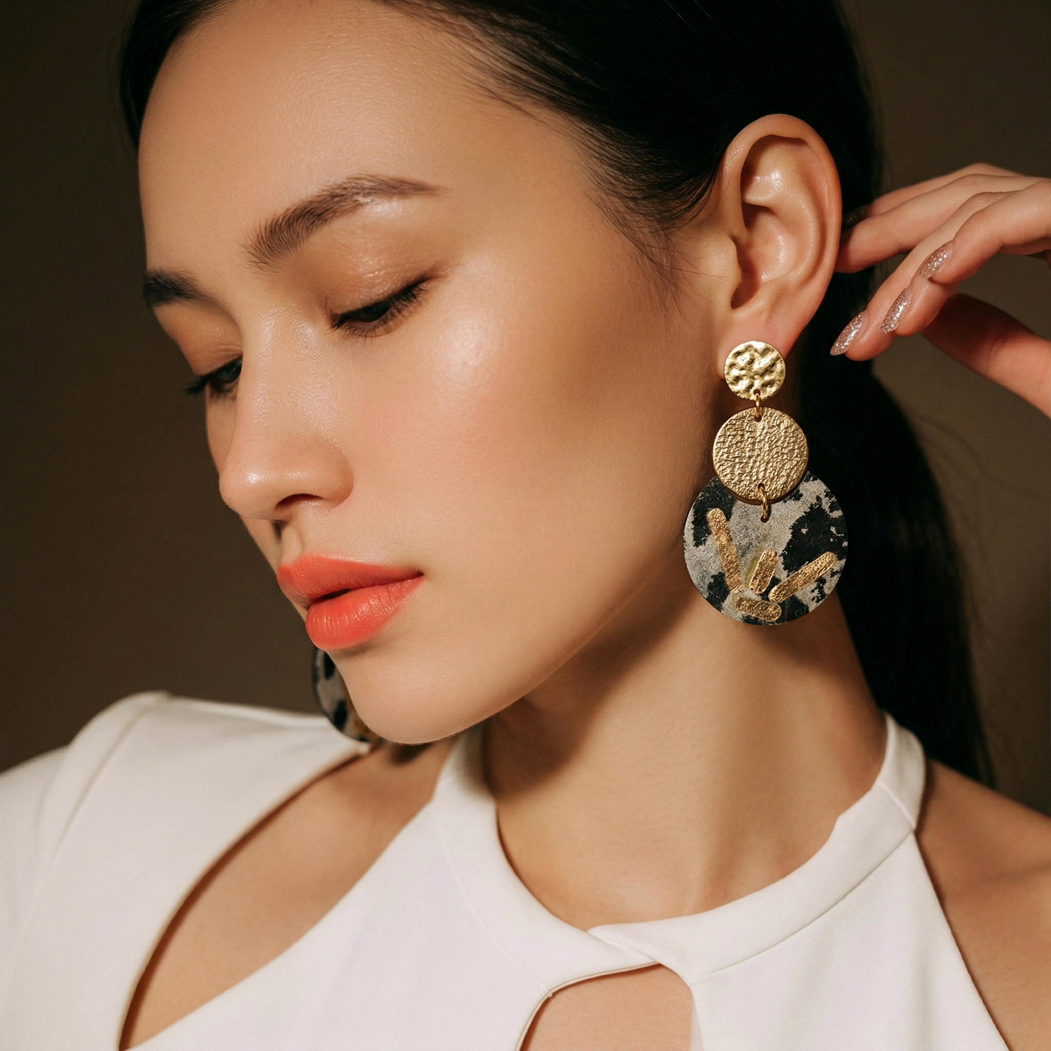 Boucles d'oreilles Eclipse en cuir doré noir (1)
