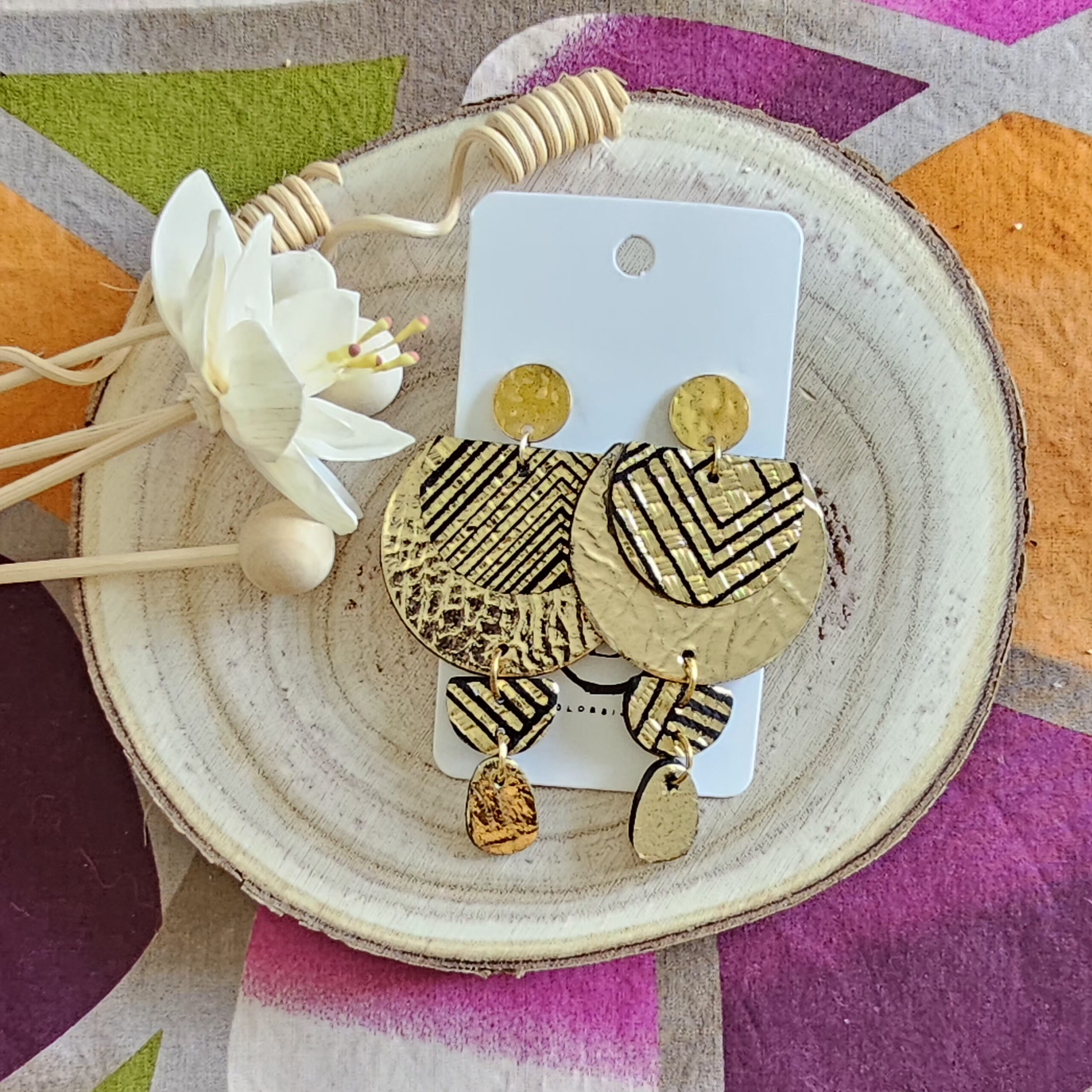 Boucles d'oreilles Glow en cuir doré (1)