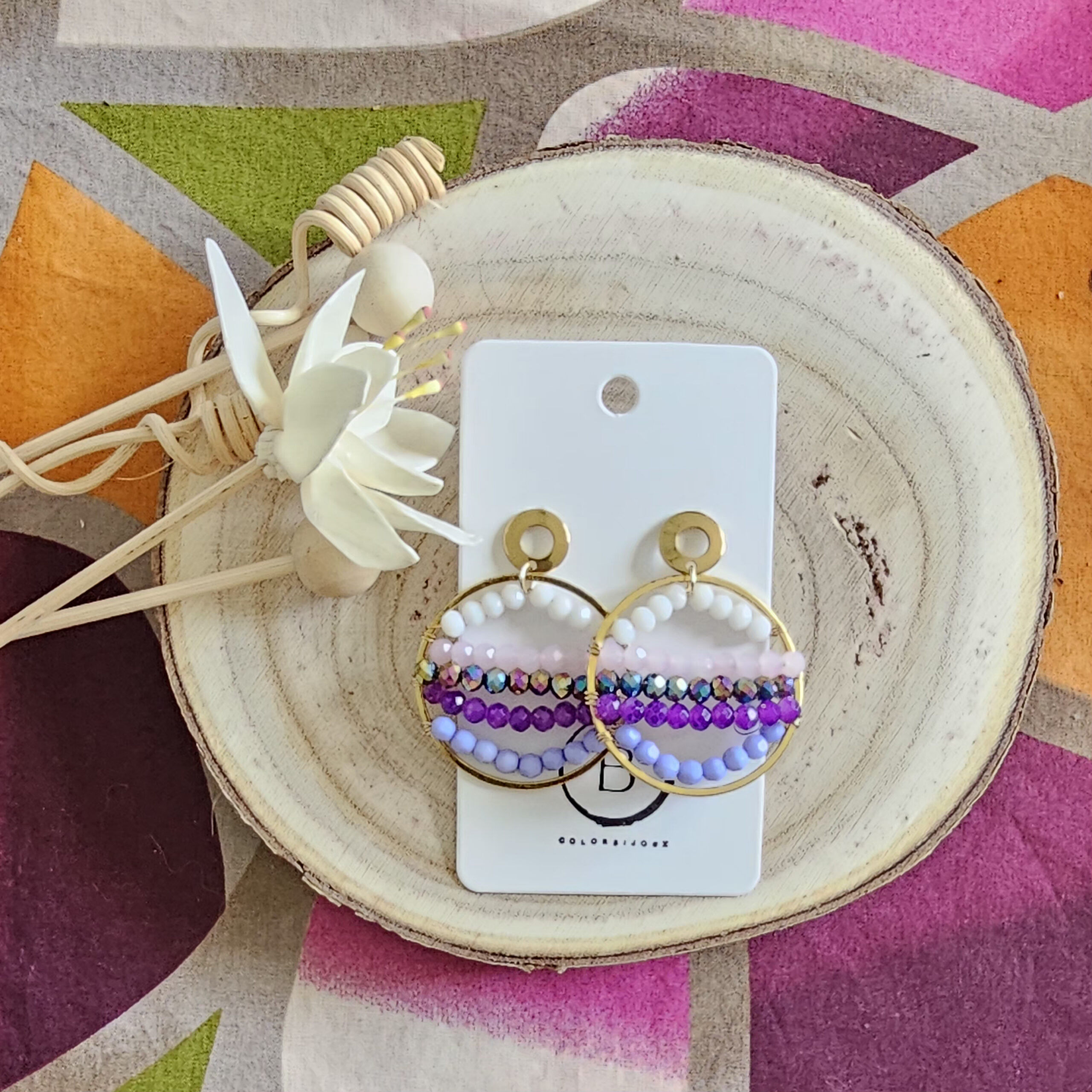 Boucles d'oreilles sunshine en perles de verre violet (1)